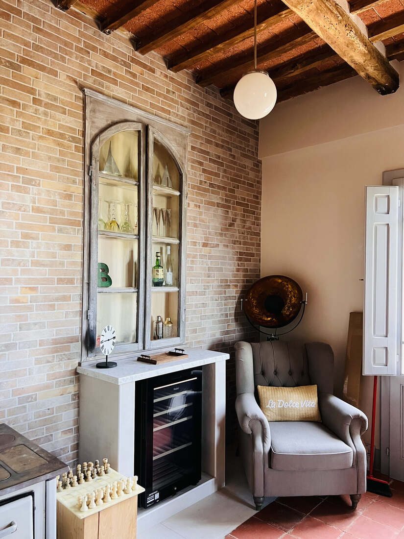 Cosy seating area by the fireplace